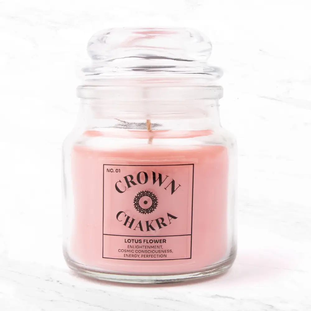 Bougie parfumée Myga Crown Chakra dans un contenant en verre.