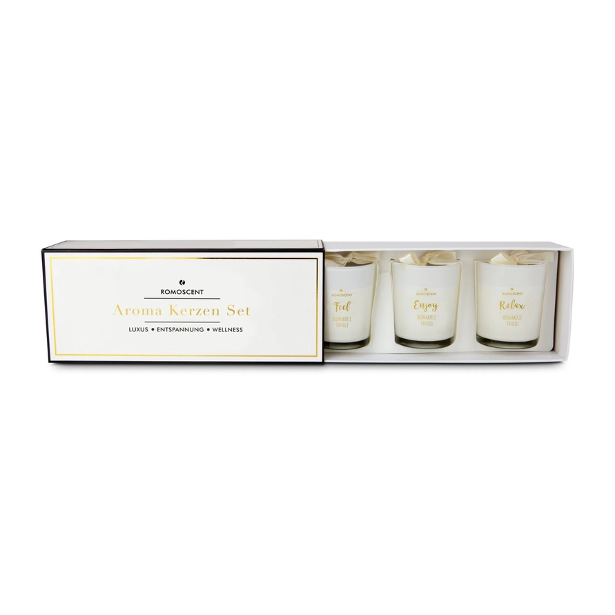 Coffret ROMOSCENT ouvert laissant apparaître les trois bougies parfumées à la vanille.