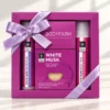 Coffret cadeau bien-être Musc Blanc Bodyfarm avec gel douche, lotion corporelle et savon dans une boîte violette avec ruban.